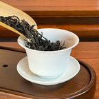 Oolong Tea Mi Lan Xiang Dan Cong (Honey Orchid Aroma) dry leaves from Chaozhou poured into tea ware