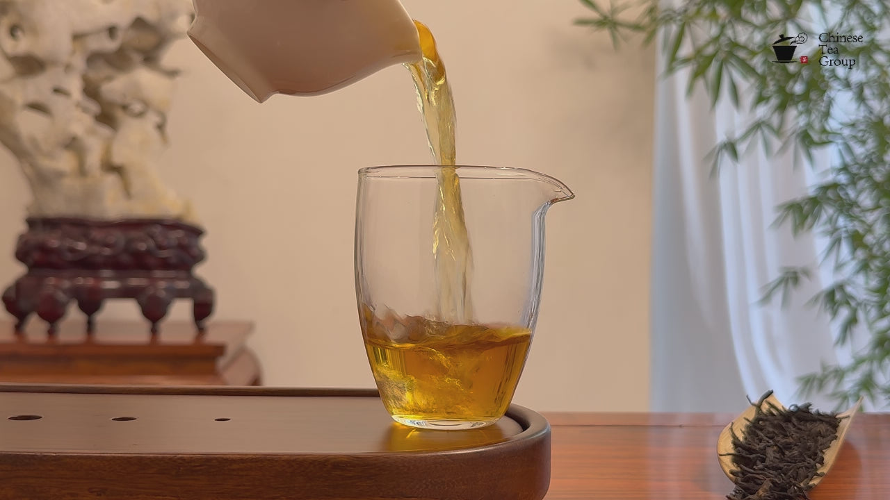 Real tea liquor of Lapsang Souchong Black Tea (Zheng Shan Xiao Zhong) in brewing video
