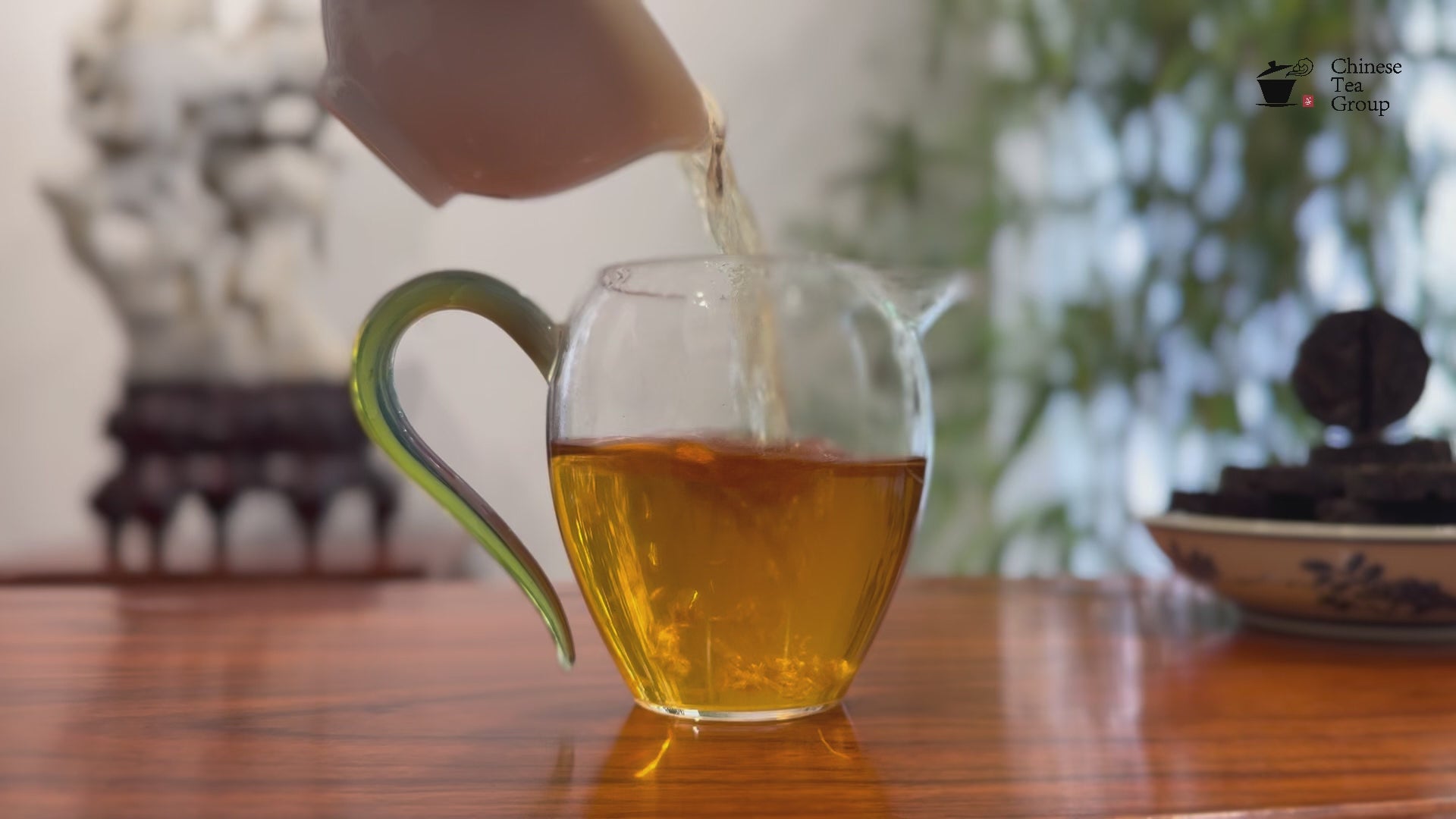 Freshly brewed tea liquor of Raw Pu-erh Mini Tea Cake - 2018 Aged at a Chinese Tea Group in China