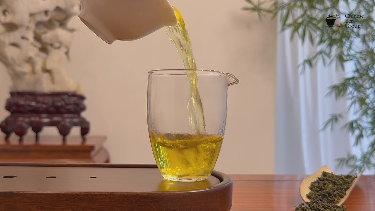 Tie Guan Yin Tea (Ti Kuan Yin / Iron Goddess) real tea video showing authentic brewed oolong tea liquor