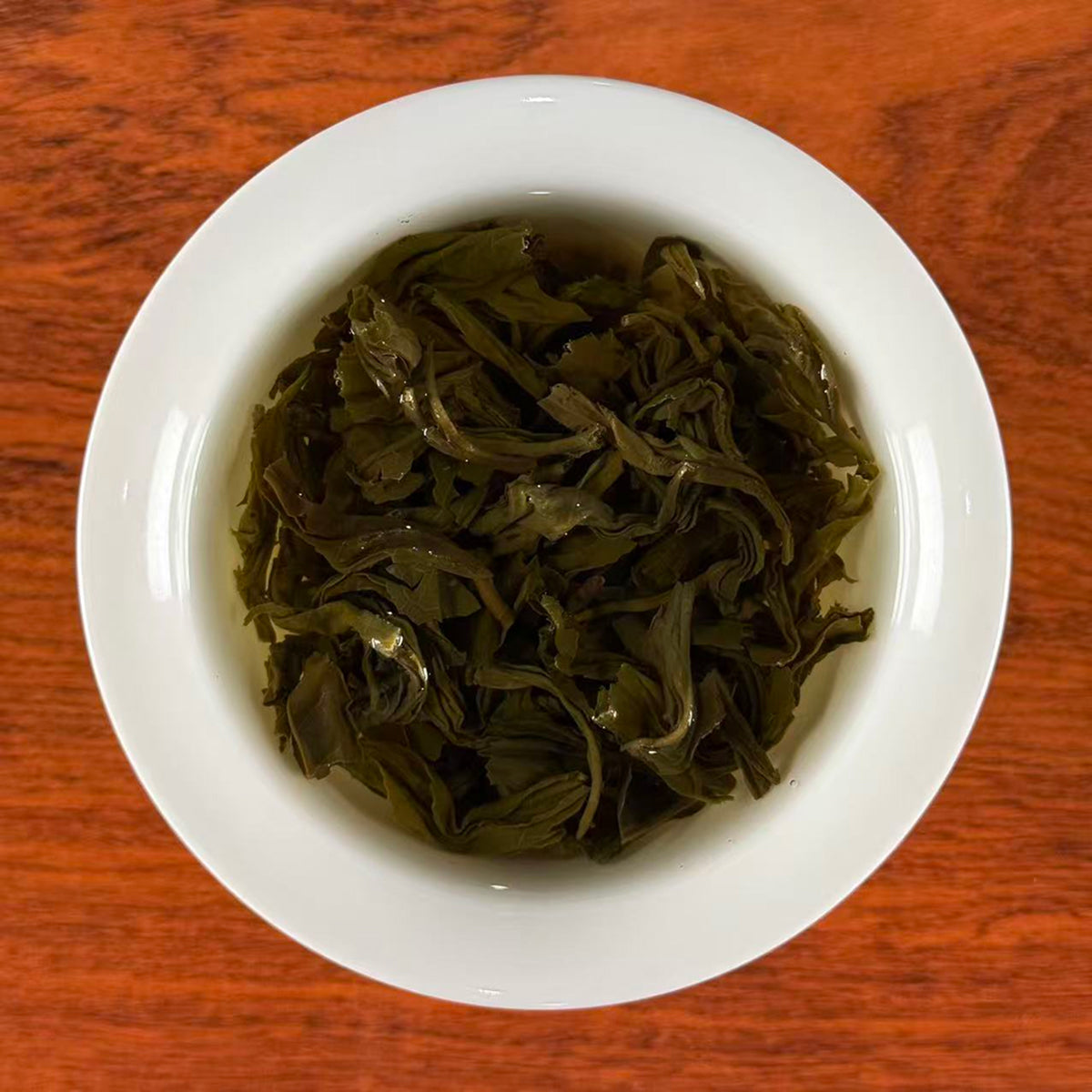 Rich Loose Leaf Green Tea Spring Harvest 2026 sample brewing on a Chinese restaurant table