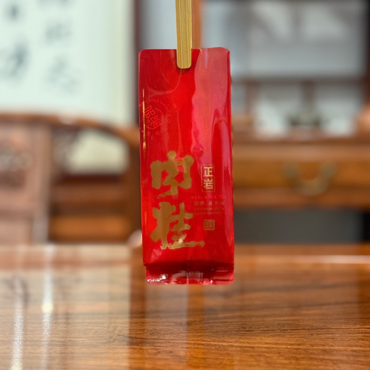 Gongfu Tea Sachets Rou Gui Rock Oolong in a Chinese Tea Group store, showing authentic tea display