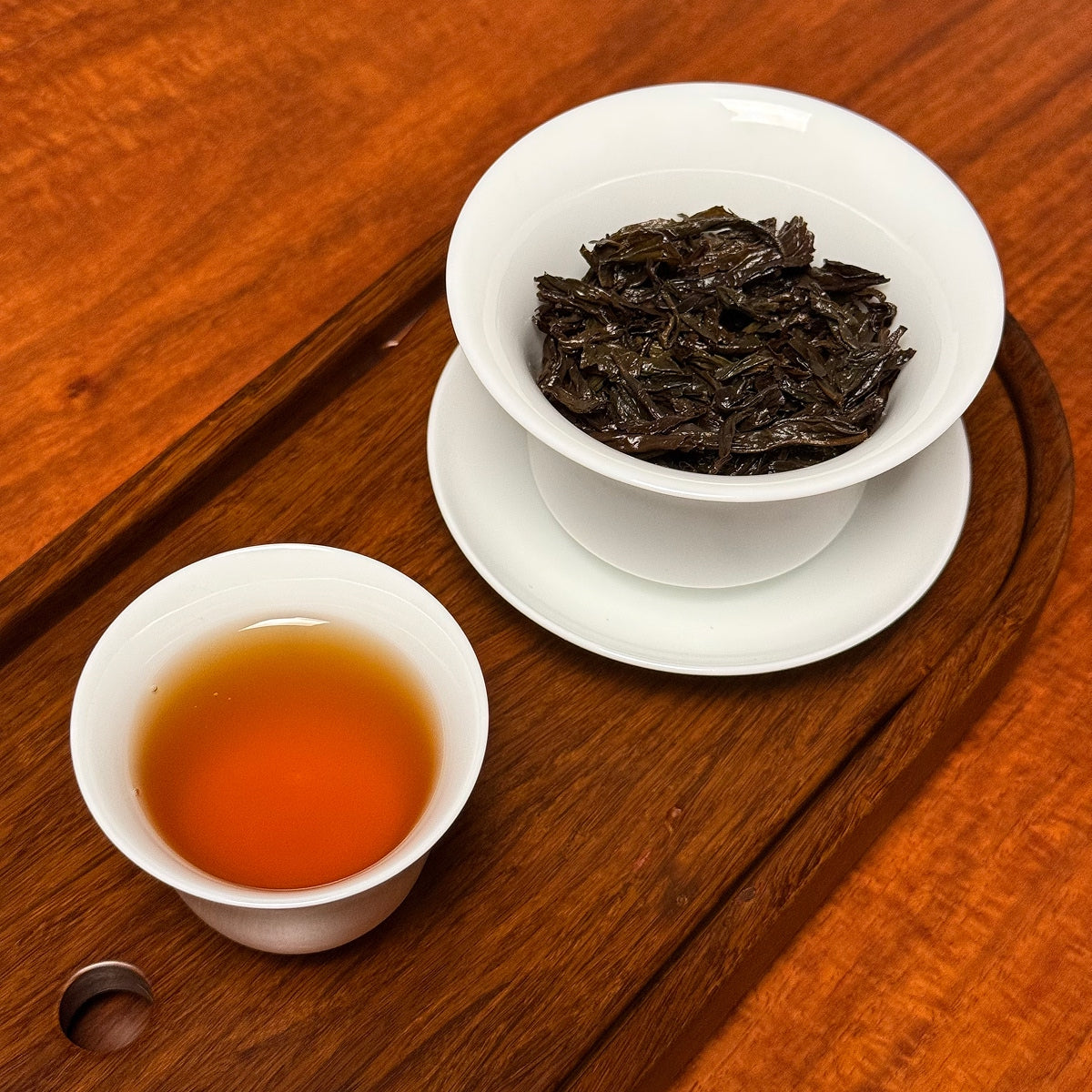 Shui Xian Oolong Tea (Shui Hsien / Narcissus) brewed tea liquor showing amber color and clarity