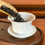 Shui Xian Oolong Tea (Shui Hsien / Narcissus) dry leaves poured into gaiwan for brewing