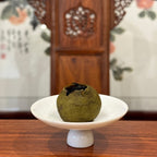 Close-up of brewed Tangerine Pu-erh Tea (Xiao Qing Gan) leaves