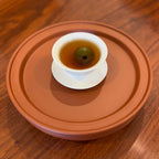 Tangerine Pu-erh Tea (Xiao Qing Gan) brewed using gaiwan