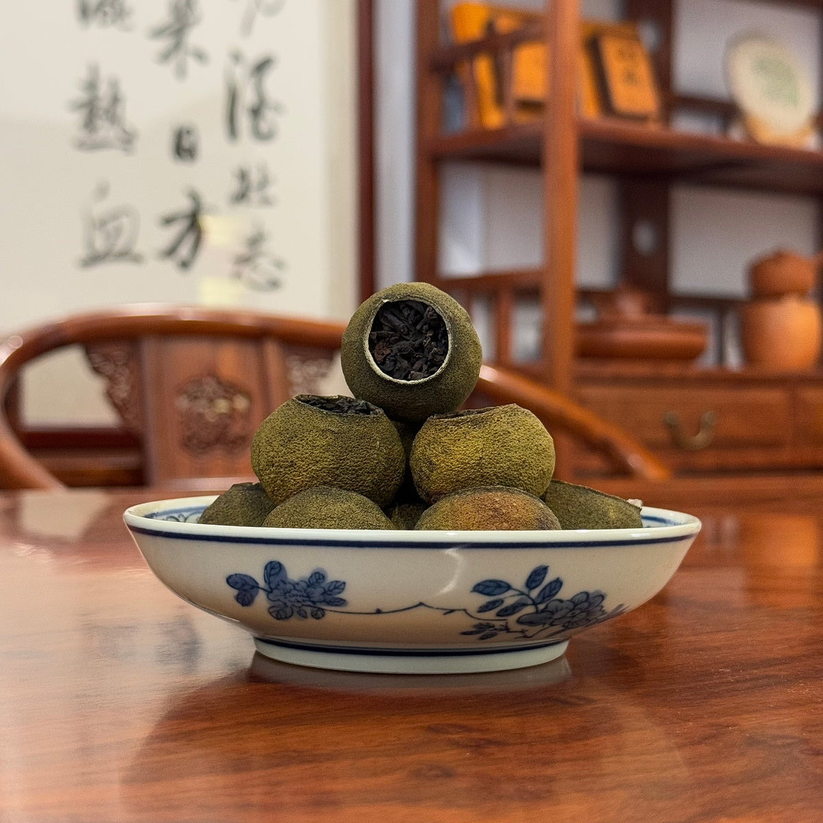 Tangerine Pu-erh Tea (Xiao Qing Gan) displayed at Chinese Tea Group teahouse