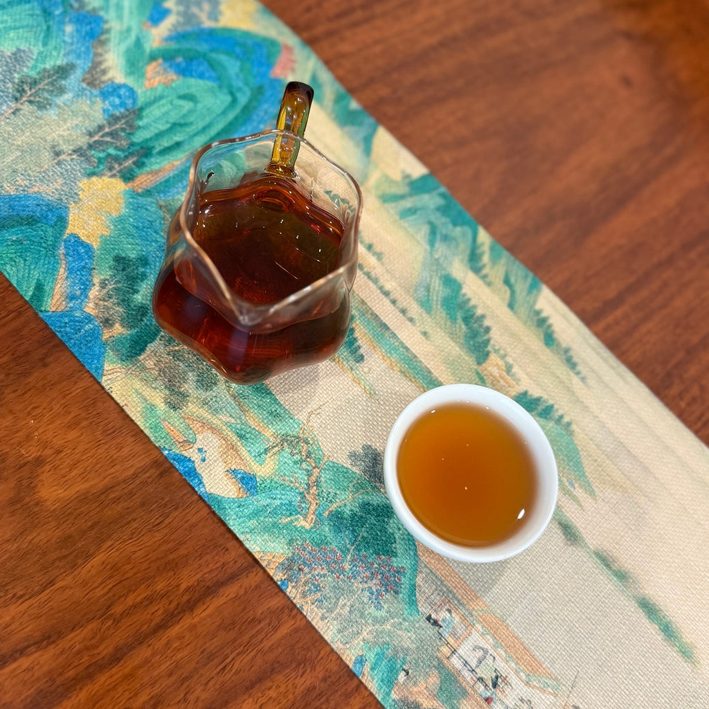Tangerine Pu-erh Tea (Xiao Qing Gan) tea liquor in cup