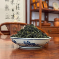Close-up of Anxi Tie Guan Yin Oolong Tea (Ti Kuan Yin) dry leaves, loose Fujian tea