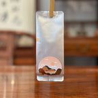 Outer packaging of Tie Guan Yin Oolong Gongfu Tea Sachets, showcasing elegant tea bag design