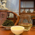 Brewed tea and leaves of Tie Guan Yin Oolong Gongfu Tea Sachets, highlighting rich aroma and flavor