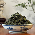 Close-up of Anxi Iron Goddess of Mercy (Tie Guan Yin) Oolong Tea Sample dry leaves