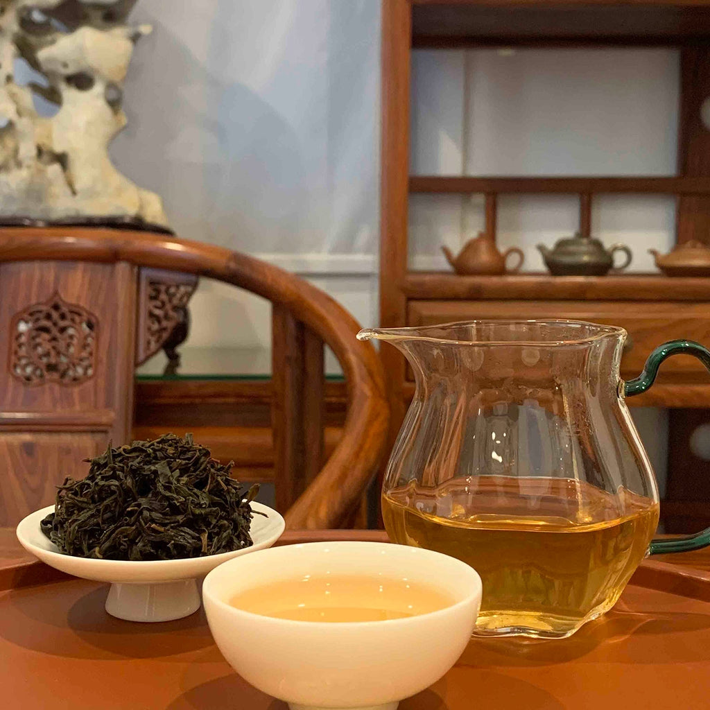 Brewed tea and wet leaves of Dan Cong Oolong Gongfu Tea Sachets, highlighting rich aroma and flavor