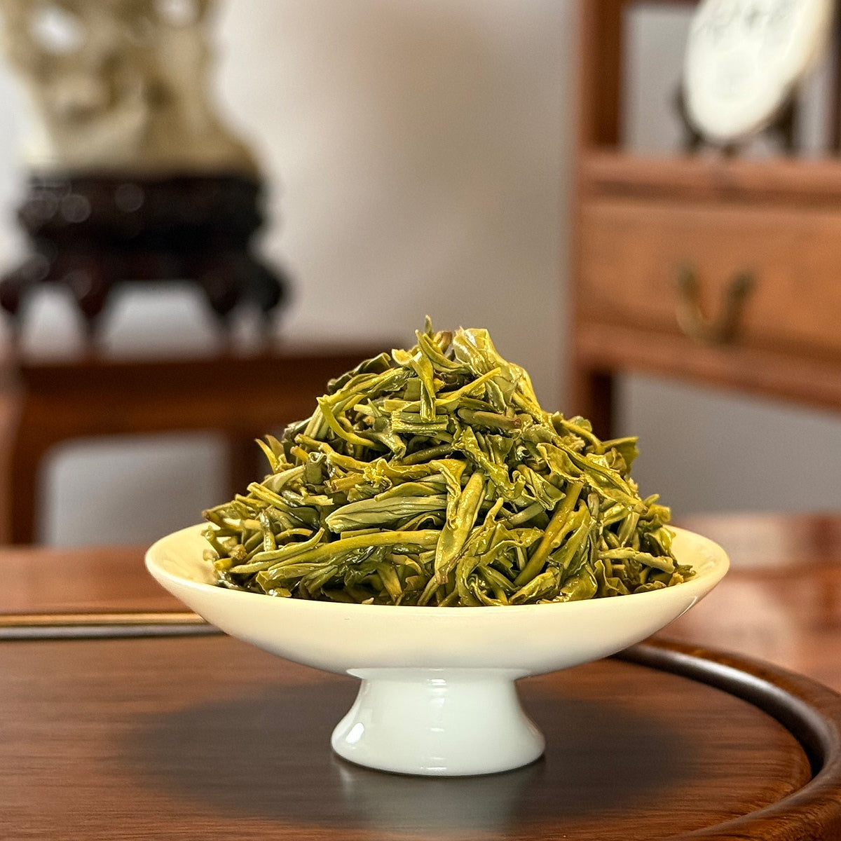 Premium Xin Yang Mao Jian Green Tea brewed leaves, green tip tea