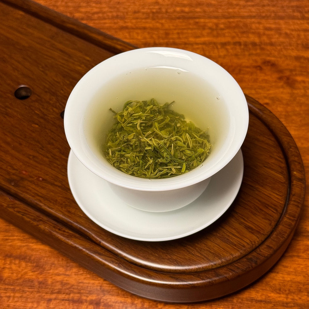 Xin Yang Mao Jian Green Tea (Green Tip Tea) loose Chinese green tea brewing showing infusion process