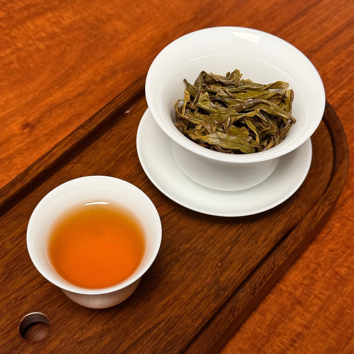 Ya Shi Xiang Dan Cong Tea (Duck Shit Aroma) Oolong liquor showing bright golden color and clarity