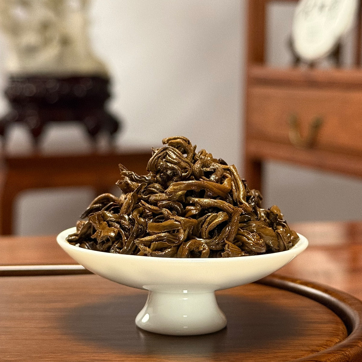 Premium Chinese Black Tea Yunnan Golden Snail (Dian Hong Jin Luo) brewed leaves