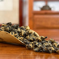 Yunnan Golden Snail Black Tea (Dian Hong Jin Luo) dry leaves detail shot in Chinese Tea Group store