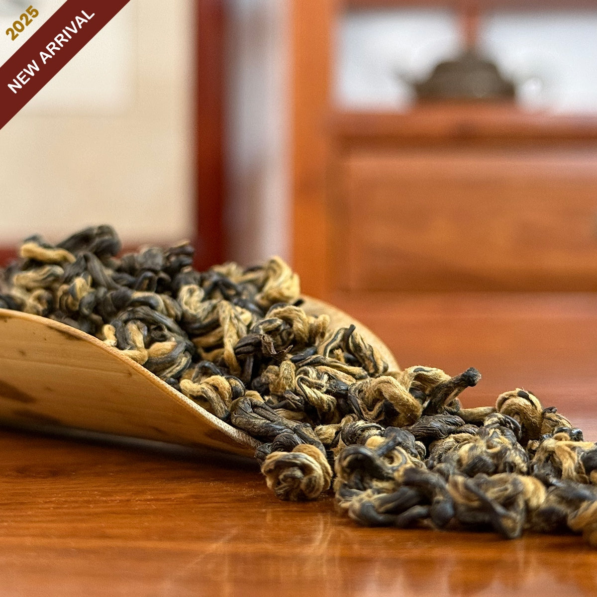 Yunnan Golden Snail Black Tea (Dian Hong Jin Luo) dry leaves detail shot in Chinese Tea Group store