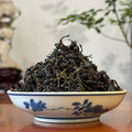 Dry tea leaves of Yunnan Green Tea Sample from China