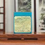 Yunnan Loose Leaf Raw Pu-erh Tea Gift Box – 2017 Aged showing bustling ancient bridge scene